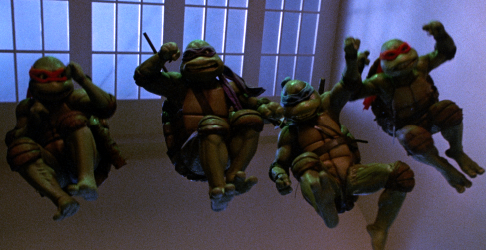 The turtles jumping into action in TMNT II 